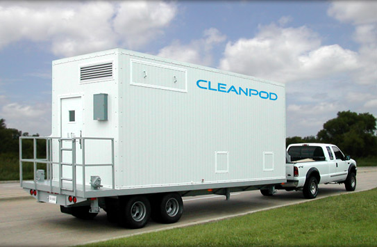 Lasco Services portable cleanroom CleanPod hitched to truck on road